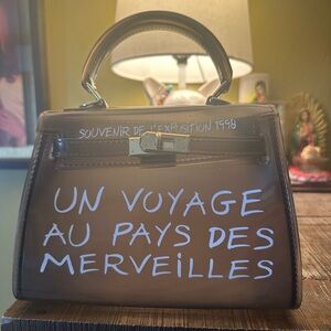 Un Voyage - transparent bag